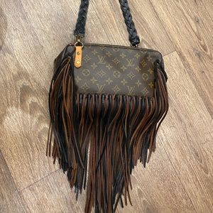 Louis Vuitton crossbody bag w/fringe